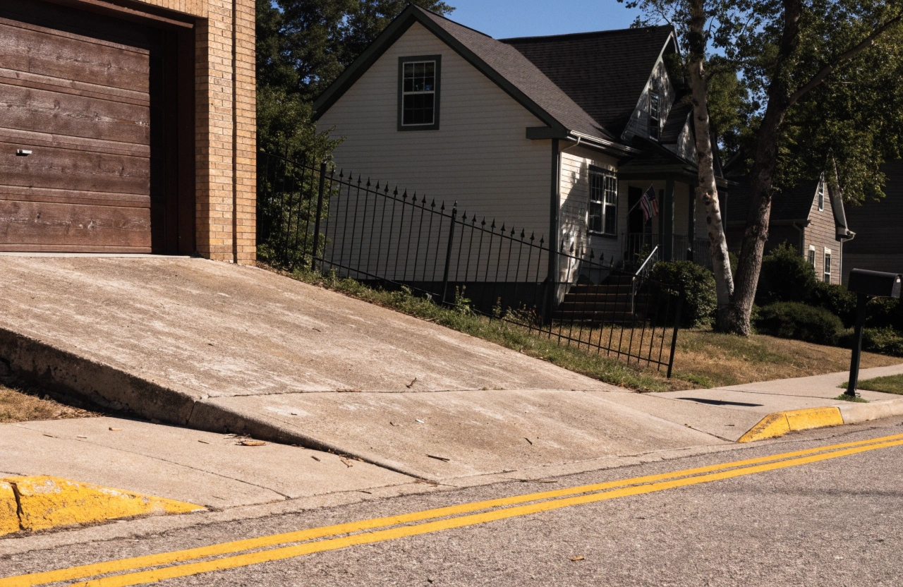Concrete driveway set on a sloping block near the Woden Valley ridgelines