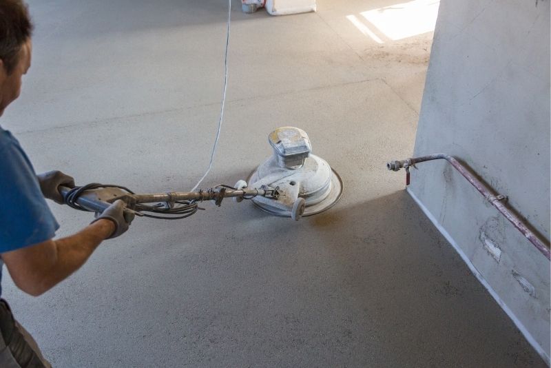 A floor with a polished concrete finish