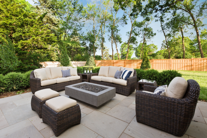 a photo of a patio concrete slab area with outdoor seating